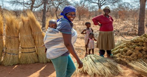 Back, carry, Africa, African, woman, wife, girl, female, people, person, traditional, blanket, children kids, child, granny, grandmother, old, pensioner, retired, village, rural, poor, poverty, third world, developing countries, baby, mother, family, black, lifestyle, son, boy, culture, holding, ethnicity, small, parent, smile, childhood, outdoors, traditional, group, many, scarf, love, loving,